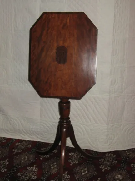 Late 18th Candlestand. Tilt-top, in rich mahogany with contrasting inlay in top. Brass catch underneath.