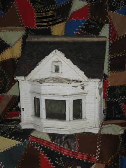 Folk Art Mailbox. In the form of a house, very high detail right down to the bark shingles on the roof!